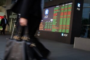 Shares end week lower as traders brace for higher rates